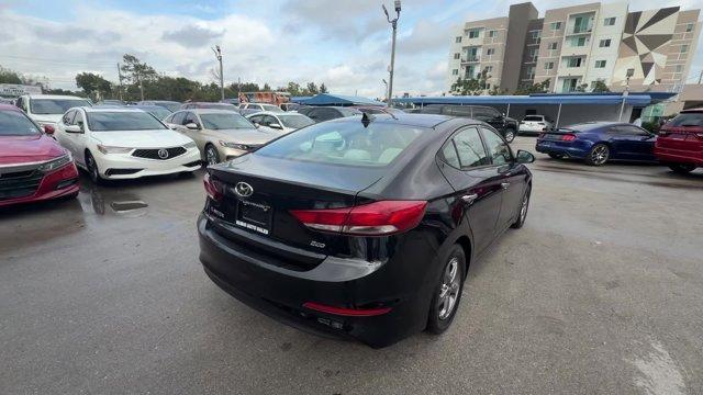 2017 Phantom Black /Beige Hyundai Elantra (5NPD94LA5HH) with an 4 1.4 L engine, Automatic transmission, located at 27610 S Dixie Hwy, Homestead, FL, 33032, (305) 749-2348, 25.510241, -80.438301 - IIHS Top Safety Pick+, Top Safety Pick+. Boasts 40 Highway MPG and 32 City MPG! This Hyundai Elantra delivers a Intercooled Turbo Regular Unleaded I-4 1.4 L/83 engine powering this Automatic transmission. REVERSIBLE CARGO TRAY, REAR BUMPER APPLIQUE, PHANTOM BLACK.*This Hyundai Elantra Comes Equipped - Photo#4