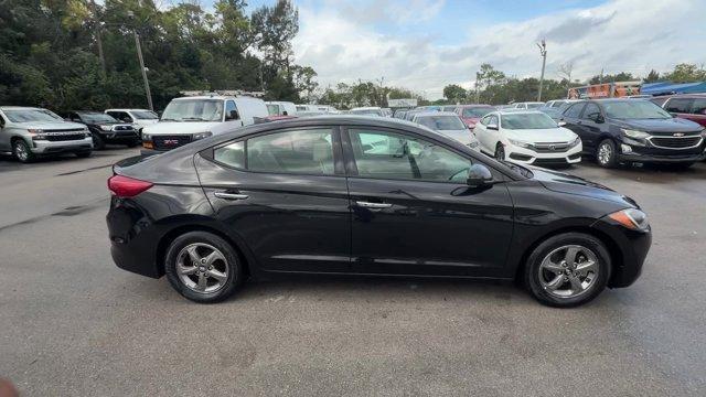2017 Phantom Black /Beige Hyundai Elantra (5NPD94LA5HH) with an 4 1.4 L engine, Automatic transmission, located at 27610 S Dixie Hwy, Homestead, FL, 33032, (305) 749-2348, 25.510241, -80.438301 - IIHS Top Safety Pick+, Top Safety Pick+. Boasts 40 Highway MPG and 32 City MPG! This Hyundai Elantra delivers a Intercooled Turbo Regular Unleaded I-4 1.4 L/83 engine powering this Automatic transmission. REVERSIBLE CARGO TRAY, REAR BUMPER APPLIQUE, PHANTOM BLACK.*This Hyundai Elantra Comes Equipped - Photo#5