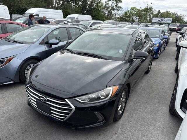 2017 Phantom Black /Beige Hyundai Elantra (5NPD94LA5HH) with an 4 1.4 L engine, Automatic transmission, located at 27610 S Dixie Hwy, Homestead, FL, 33032, (305) 749-2348, 25.510241, -80.438301 - IIHS Top Safety Pick+, Top Safety Pick+. Boasts 40 Highway MPG and 32 City MPG! This Hyundai Elantra delivers a Intercooled Turbo Regular Unleaded I-4 1.4 L/83 engine powering this Automatic transmission. REVERSIBLE CARGO TRAY, REAR BUMPER APPLIQUE, PHANTOM BLACK.*This Hyundai Elantra Comes Equipped - Photo#0