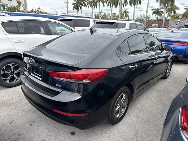 2017 Phantom Black /Beige Hyundai Elantra (5NPD94LA5HH) with an 4 1.4 L engine, Automatic transmission, located at 27610 S Dixie Hwy, Homestead, FL, 33032, (305) 749-2348, 25.510241, -80.438301 - IIHS Top Safety Pick+, Top Safety Pick+. Boasts 40 Highway MPG and 32 City MPG! This Hyundai Elantra delivers a Intercooled Turbo Regular Unleaded I-4 1.4 L/83 engine powering this Automatic transmission. REVERSIBLE CARGO TRAY, REAR BUMPER APPLIQUE, PHANTOM BLACK.*This Hyundai Elantra Comes Equipped - Photo#2