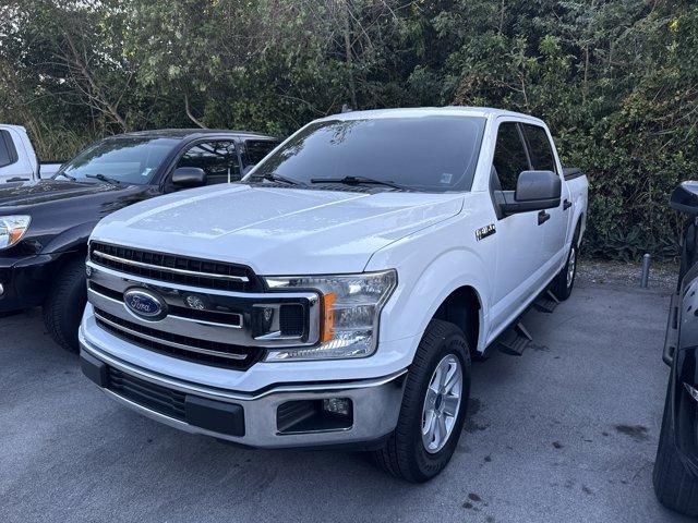 2020 White Ford F-150 (1FTEW1C51LF) with an 8 5.0 L engine, Automatic transmission, located at 27610 S Dixie Hwy, Homestead, FL, 33032, (305) 749-2348, 25.510241, -80.438301 - This Ford F-150 boasts a Regular Unleaded V8 5.0 L engine powering this Automatic transmission. ENGINE: 5.0L V8 -inc: auto start-stop technology and flex-fuel capability, GVWR: 6,800 lbs Payload Package, 3.15 Axle Ratio, Transmission w/Driver Selectable Mode and SelectShift Sequential Shift Control, - Photo#0