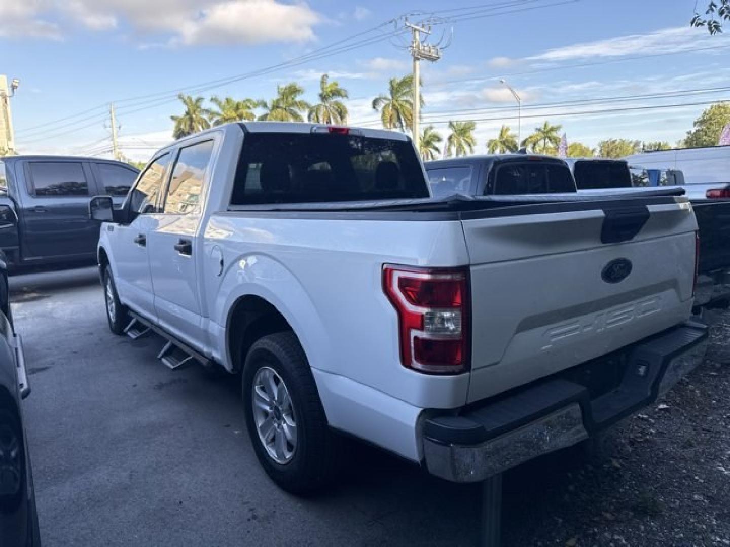 2020 White Ford F-150 (1FTEW1C51LF) with an 8 5.0 L engine, Automatic transmission, located at 27610 S Dixie Hwy, Homestead, FL, 33032, (305) 749-2348, 25.510241, -80.438301 - This Ford F-150 boasts a Regular Unleaded V8 5.0 L engine powering this Automatic transmission. ENGINE: 5.0L V8 -inc: auto start-stop technology and flex-fuel capability, GVWR: 6,800 lbs Payload Package, 3.15 Axle Ratio, Transmission w/Driver Selectable Mode and SelectShift Sequential Shift Control, - Photo#1
