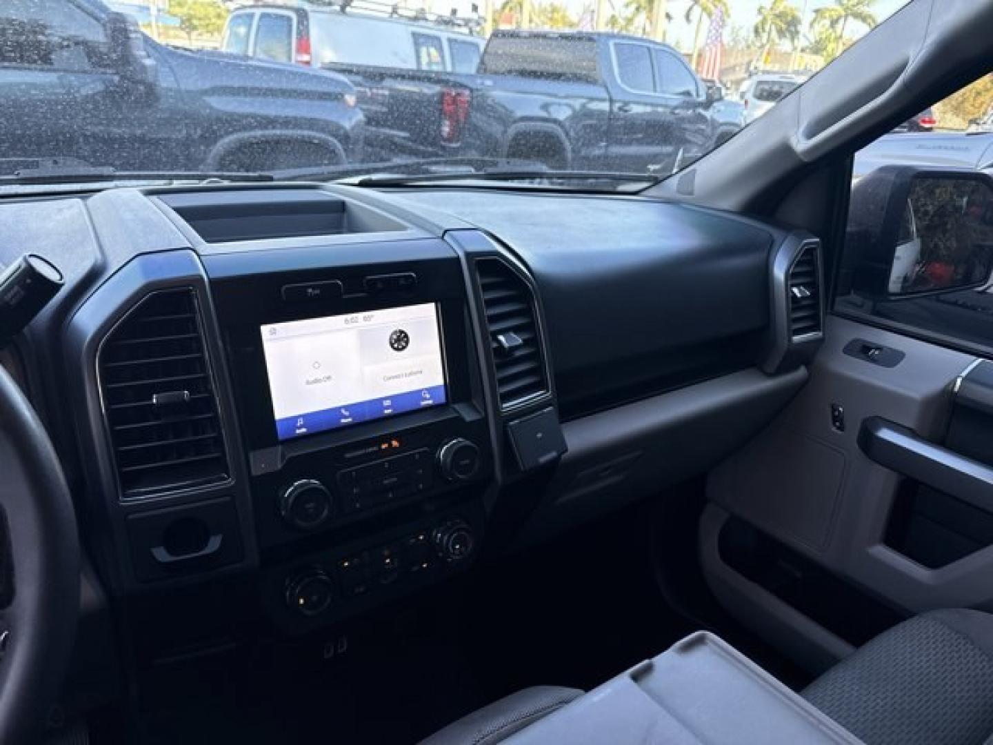 2020 White Ford F-150 (1FTEW1C51LF) with an 8 5.0 L engine, Automatic transmission, located at 27610 S Dixie Hwy, Homestead, FL, 33032, (305) 749-2348, 25.510241, -80.438301 - This Ford F-150 boasts a Regular Unleaded V8 5.0 L engine powering this Automatic transmission. ENGINE: 5.0L V8 -inc: auto start-stop technology and flex-fuel capability, GVWR: 6,800 lbs Payload Package, 3.15 Axle Ratio, Transmission w/Driver Selectable Mode and SelectShift Sequential Shift Control, - Photo#7
