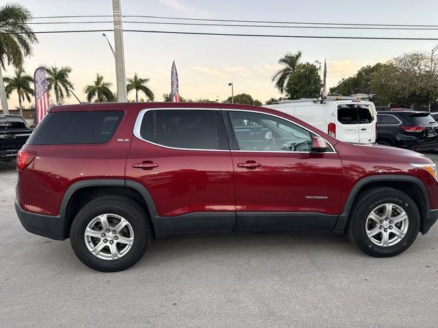 2019 Red Quartz Tintcoat /Jet Black GMC Acadia (1GKKNKLA0KZ) with an 4 2.5L engine, Automatic transmission, located at 27610 S Dixie Hwy, Homestead, FL, 33032, (305) 749-2348, 25.510241, -80.438301 - Delivers 26 Highway MPG and 21 City MPG! This GMC Acadia delivers a Gas I4 2.5L/150 engine powering this Automatic transmission. SLE PREFERRED EQUIPMENT GROUP includes standard equipment, SEATS, FRONT BUCKET (STD), Wipers, front intermittent with washers.* This GMC Acadia Features the Following Opti - Photo#3