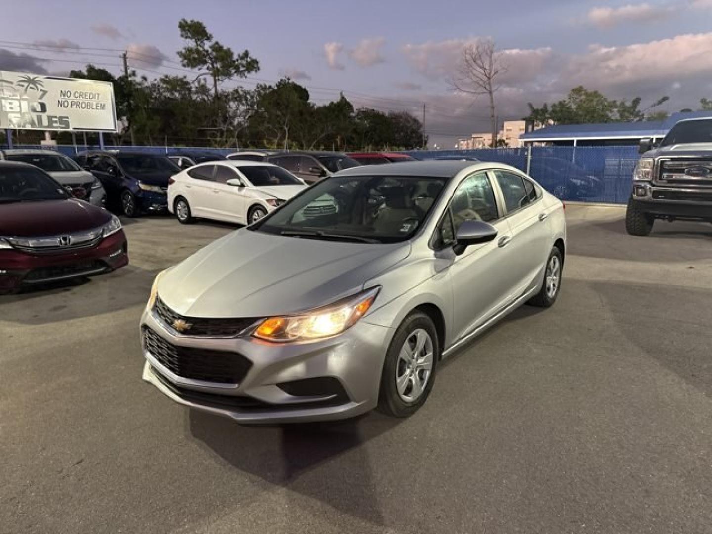 2018 Silver Ice Metallic /Dark Atmosphere/Medium Atmosphere Chevrolet Cruze (1G1BC5SM7J7) with an 4 1.4L engine, Automatic transmission, located at 27610 S Dixie Hwy, Homestead, FL, 33032, (305) 749-2348, 25.510241, -80.438301 - KBB.com 10 Most Awarded Brands. Only 74,466 Miles! Scores 40 Highway MPG and 29 City MPG! This Chevrolet Cruze boasts a Turbocharged Gas I4 1.4L/ engine powering this Automatic transmission. TRANSMISSION, 6-SPEED AUTOMATIC (STD), SILVER ICE METALLIC, SEATS, FRONT BUCKET WITH RECLINING SEATBACKS AND - Photo#0