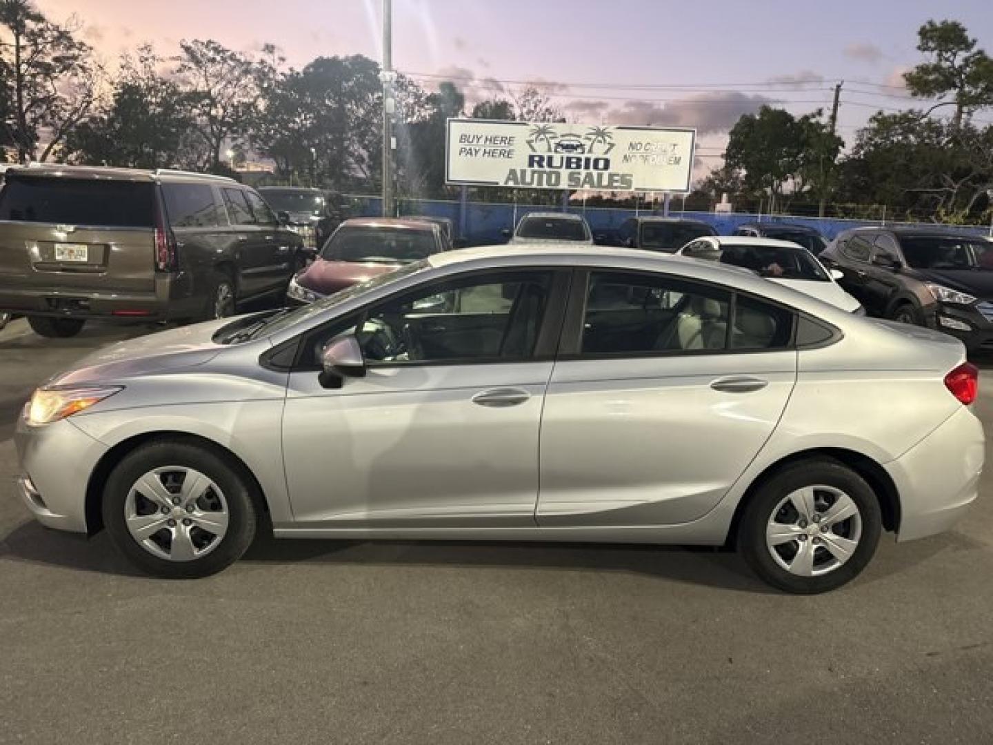 2018 Silver Ice Metallic /Dark Atmosphere/Medium Atmosphere Chevrolet Cruze (1G1BC5SM7J7) with an 4 1.4L engine, Automatic transmission, located at 27610 S Dixie Hwy, Homestead, FL, 33032, (305) 749-2348, 25.510241, -80.438301 - KBB.com 10 Most Awarded Brands. Only 74,466 Miles! Scores 40 Highway MPG and 29 City MPG! This Chevrolet Cruze boasts a Turbocharged Gas I4 1.4L/ engine powering this Automatic transmission. TRANSMISSION, 6-SPEED AUTOMATIC (STD), SILVER ICE METALLIC, SEATS, FRONT BUCKET WITH RECLINING SEATBACKS AND - Photo#1