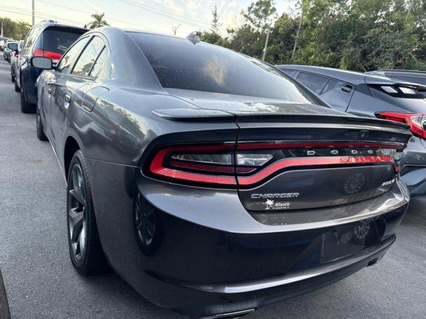 2017 Granite Pearlcoat /Black Dodge Charger (2C3CDXHG9HH) with an 6 3.6 L engine, Automatic transmission, located at 27610 S Dixie Hwy, Homestead, FL, 33032, (305) 749-2348, 25.510241, -80.438301 - KBB.com 10 Most Comfortable Cars Under $30,000. Delivers 30 Highway MPG and 19 City MPG! This Dodge Charger boasts a Regular Unleaded V-6 3.6 L/220 engine powering this Automatic transmission. TRANSMISSION: 8-SPEED AUTOMATIC (845RE) (STD), TIRES: P245/45R20 BSW AS PERFORMANCE, RALLYE GROUP -inc: Ste - Photo#1