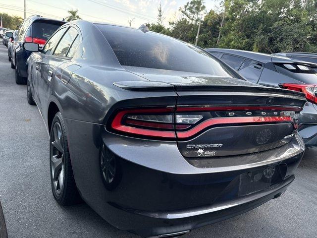 2017 Granite Pearlcoat /Black Dodge Charger (2C3CDXHG9HH) with an 6 3.6 L engine, Automatic transmission, located at 27610 S Dixie Hwy, Homestead, FL, 33032, (305) 749-2348, 25.510241, -80.438301 - KBB.com 10 Most Comfortable Cars Under $30,000. Delivers 30 Highway MPG and 19 City MPG! This Dodge Charger boasts a Regular Unleaded V-6 3.6 L/220 engine powering this Automatic transmission. TRANSMISSION: 8-SPEED AUTOMATIC (845RE) (STD), TIRES: P245/45R20 BSW AS PERFORMANCE, RALLYE GROUP -inc: Ste - Photo#1