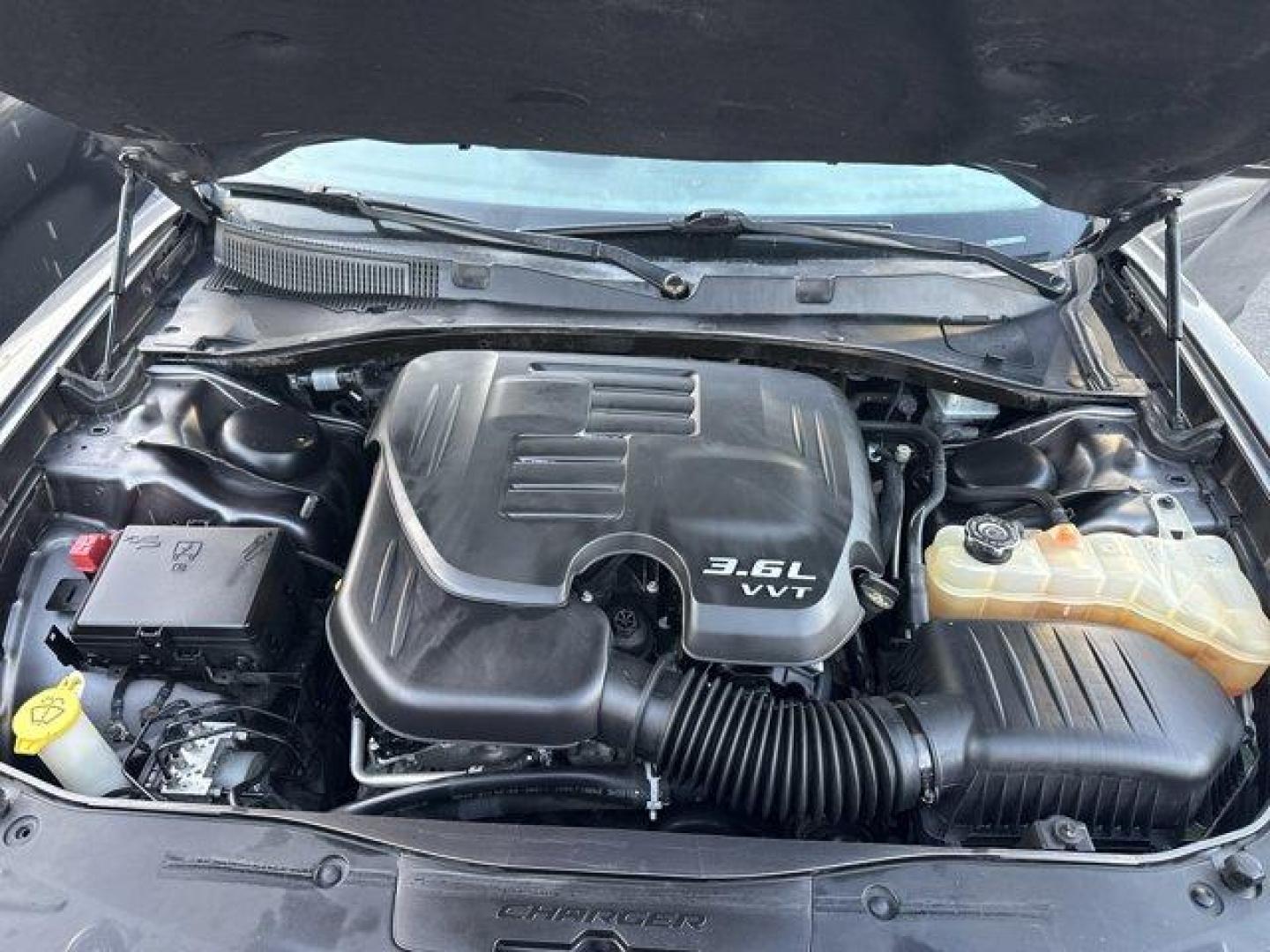 2017 Granite Pearlcoat /Black Dodge Charger (2C3CDXHG9HH) with an 6 3.6 L engine, Automatic transmission, located at 27610 S Dixie Hwy, Homestead, FL, 33032, (305) 749-2348, 25.510241, -80.438301 - KBB.com 10 Most Comfortable Cars Under $30,000. Delivers 30 Highway MPG and 19 City MPG! This Dodge Charger boasts a Regular Unleaded V-6 3.6 L/220 engine powering this Automatic transmission. TRANSMISSION: 8-SPEED AUTOMATIC (845RE) (STD), TIRES: P245/45R20 BSW AS PERFORMANCE, RALLYE GROUP -inc: Ste - Photo#4