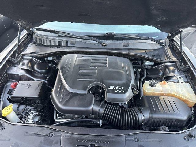 2017 Granite Pearlcoat /Black Dodge Charger (2C3CDXHG9HH) with an 6 3.6 L engine, Automatic transmission, located at 27610 S Dixie Hwy, Homestead, FL, 33032, (305) 749-2348, 25.510241, -80.438301 - KBB.com 10 Most Comfortable Cars Under $30,000. Delivers 30 Highway MPG and 19 City MPG! This Dodge Charger boasts a Regular Unleaded V-6 3.6 L/220 engine powering this Automatic transmission. TRANSMISSION: 8-SPEED AUTOMATIC (845RE) (STD), TIRES: P245/45R20 BSW AS PERFORMANCE, RALLYE GROUP -inc: Ste - Photo#4