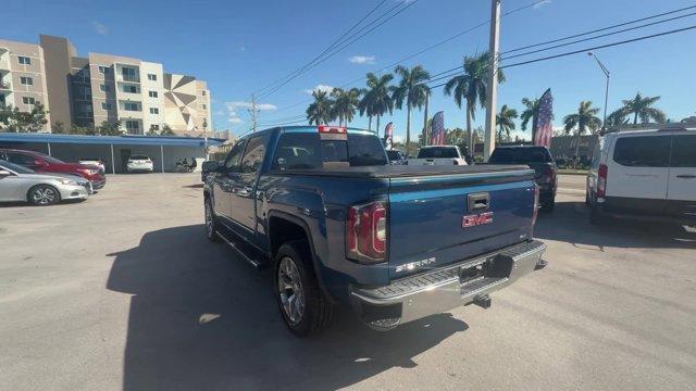 2018 Stone Blue Metallic /Dark Ash seats with Jet Black interior accents GMC Sierra 1500 (3GTU2NEC1JG) with an 8 5.3L engine, Automatic transmission, located at 27610 S Dixie Hwy, Homestead, FL, 33032, (305) 749-2348, 25.510241, -80.438301 - Delivers 20 Highway MPG and 15 City MPG! This GMC Sierra 1500 delivers a Gas V8 5.3L/325 engine powering this Automatic transmission. WIRELESS CHARGING, WINDOW, POWER, REAR SLIDING WITH REAR DEFOGGER, WHEELS, 20 X 9 (50.8 CM X 22.9 CM) POLISHED ALUMINUM.* This GMC Sierra 1500 Features the Following - Photo#2