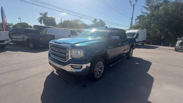 2018 Stone Blue Metallic /Dark Ash seats with Jet Black interior accents GMC Sierra 1500 (3GTU2NEC1JG) with an 8 5.3L engine, Automatic transmission, located at 27610 S Dixie Hwy, Homestead, FL, 33032, (305) 749-2348, 25.510241, -80.438301 - Delivers 20 Highway MPG and 15 City MPG! This GMC Sierra 1500 delivers a Gas V8 5.3L/325 engine powering this Automatic transmission. WIRELESS CHARGING, WINDOW, POWER, REAR SLIDING WITH REAR DEFOGGER, WHEELS, 20 X 9 (50.8 CM X 22.9 CM) POLISHED ALUMINUM.* This GMC Sierra 1500 Features the Following - Photo#0