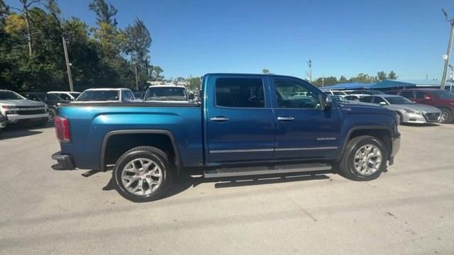 2018 Stone Blue Metallic /Dark Ash seats with Jet Black interior accents GMC Sierra 1500 (3GTU2NEC1JG) with an 8 5.3L engine, Automatic transmission, located at 27610 S Dixie Hwy, Homestead, FL, 33032, (305) 749-2348, 25.510241, -80.438301 - Delivers 20 Highway MPG and 15 City MPG! This GMC Sierra 1500 delivers a Gas V8 5.3L/325 engine powering this Automatic transmission. WIRELESS CHARGING, WINDOW, POWER, REAR SLIDING WITH REAR DEFOGGER, WHEELS, 20 X 9 (50.8 CM X 22.9 CM) POLISHED ALUMINUM.* This GMC Sierra 1500 Features the Following - Photo#5