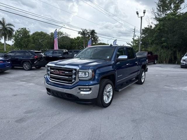 2018 Stone Blue Metallic /Dark Ash seats with Jet Black interior accents GMC Sierra 1500 (3GTU2NEC1JG) with an 8 5.3L engine, Automatic transmission, located at 27610 S Dixie Hwy, Homestead, FL, 33032, (305) 749-2348, 25.510241, -80.438301 - Delivers 20 Highway MPG and 15 City MPG! This GMC Sierra 1500 delivers a Gas V8 5.3L/325 engine powering this Automatic transmission. WIRELESS CHARGING, WINDOW, POWER, REAR SLIDING WITH REAR DEFOGGER, WHEELS, 20 X 9 (50.8 CM X 22.9 CM) POLISHED ALUMINUM.* This GMC Sierra 1500 Features the Following - Photo#0