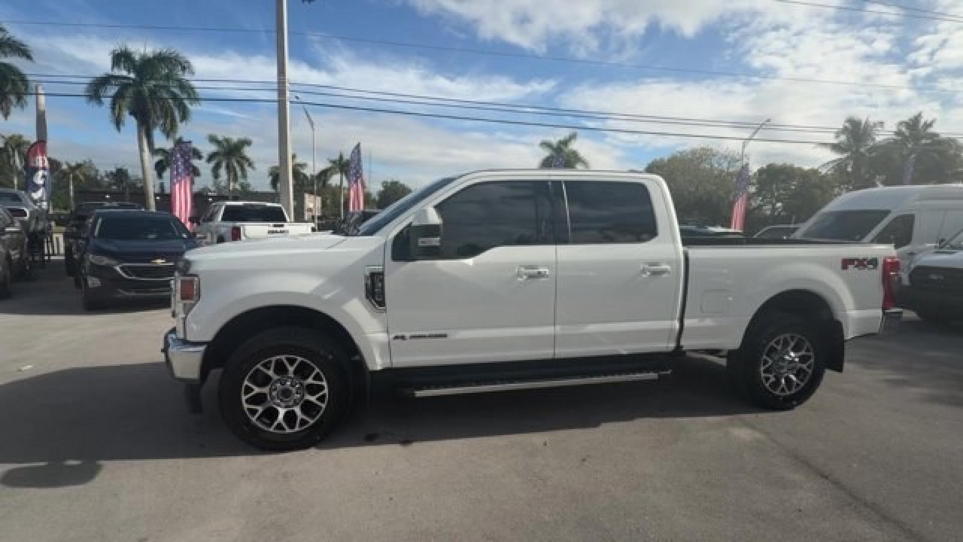 2021 White Ford Super Duty F-350 SRW (1FT8W3BT1ME) with an 8 6.7 L engine, Automatic transmission, located at 27610 S Dixie Hwy, Homestead, FL, 33032, (305) 749-2348, 25.510241, -80.438301 - This Ford Super Duty F-350 SRW boasts a Intercooled Turbo Diesel V-8 6.7 L/406 engine powering this Automatic transmission. Urethane Gear Shifter Material, Trip Computer, Transmission w/Driver Selectable Mode and Oil Cooler.* This Ford Super Duty F-350 SRW Features the Following Options *Trailer Wir - Photo#0