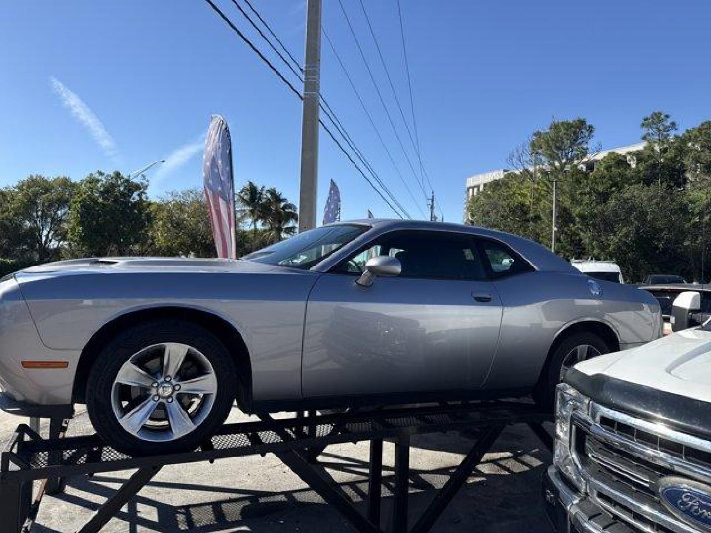 2016 Billet Clearcoat /Black Dodge Challenger (2C3CDZAG8GH) with an 6 3.6 L engine, Automatic transmission, located at 27610 S Dixie Hwy, Homestead, FL, 33032, (305) 749-2348, 25.510241, -80.438301 - Only 100,123 Miles! Scores 30 Highway MPG and 19 City MPG! This Dodge Challenger delivers a Regular Unleaded V-6 3.6 L/220 engine powering this Automatic transmission. WHEELS: 18 X 7.5 CAST ALUMINUM (STD), TRANSMISSION: 8-SPEED AUTOMATIC (845RE) (STD), TIRES: P235/55R18 AS PERFORMANCE (STD).* This D - Photo#1