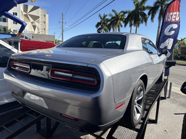 2016 Billet Clearcoat /Black Dodge Challenger (2C3CDZAG8GH) with an 6 3.6 L engine, Automatic transmission, located at 27610 S Dixie Hwy, Homestead, FL, 33032, (305) 749-2348, 25.510241, -80.438301 - Only 100,123 Miles! Scores 30 Highway MPG and 19 City MPG! This Dodge Challenger delivers a Regular Unleaded V-6 3.6 L/220 engine powering this Automatic transmission. WHEELS: 18 X 7.5 CAST ALUMINUM (STD), TRANSMISSION: 8-SPEED AUTOMATIC (845RE) (STD), TIRES: P235/55R18 AS PERFORMANCE (STD).* This D - Photo#4