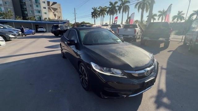 2017 Black Honda Accord Coupe (1HGCT1B71HA) with an 4 2.4 L engine, Variable transmission, located at 27610 S Dixie Hwy, Homestead, FL, 33032, (305) 749-2348, 25.510241, -80.438301 - IIHS Top Safety Pick. Delivers 34 Highway MPG and 26 City MPG! This Honda Accord Coupe delivers a Regular Unleaded I-4 2.4 L/144 engine powering this Variable transmission. Wireless Phone Connectivity, Window Grid Antenna, Wheels: 18 Alloy.*This Honda Accord Coupe Comes Equipped with These Options * - Photo#5
