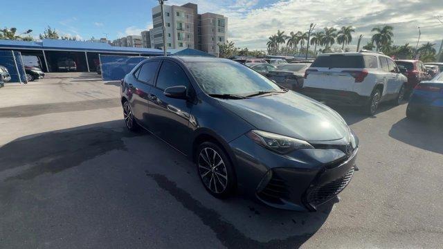 2018 Gray Toyota Corolla (5YFBURHEXJP) with an 4 1.8 L engine, Variable transmission, located at 27610 S Dixie Hwy, Homestead, FL, 33032, (305) 749-2348, 25.510241, -80.438301 - KBB.com 10 Most Awarded Brands. This Toyota Corolla boasts a Regular Unleaded I-4 1.8 L/110 engine powering this Variable transmission. Wireless Phone Connectivity, Urethane Gear Shifter Material, Trunk Rear Cargo Access.*This Toyota Corolla Comes Equipped with These Options *Trip Computer, Transmis - Photo#5