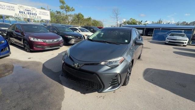 2018 Gray Toyota Corolla (5YFBURHEXJP) with an 4 1.8 L engine, Variable transmission, located at 27610 S Dixie Hwy, Homestead, FL, 33032, (305) 749-2348, 25.510241, -80.438301 - KBB.com 10 Most Awarded Brands. This Toyota Corolla boasts a Regular Unleaded I-4 1.8 L/110 engine powering this Variable transmission. Wireless Phone Connectivity, Urethane Gear Shifter Material, Trunk Rear Cargo Access.*This Toyota Corolla Comes Equipped with These Options *Trip Computer, Transmis - Photo#0
