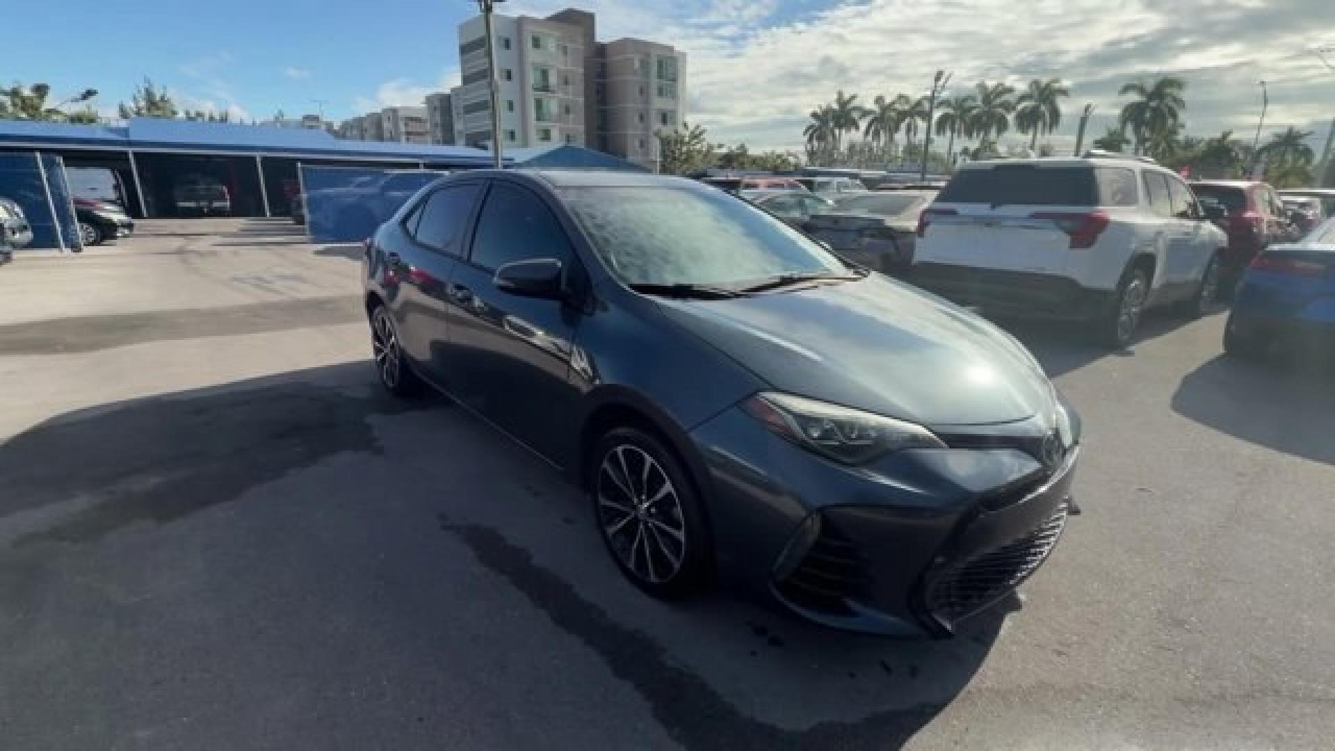 2018 Gray Toyota Corolla (5YFBURHEXJP) with an 4 1.8 L engine, Variable transmission, located at 27610 S Dixie Hwy, Homestead, FL, 33032, (305) 749-2348, 25.510241, -80.438301 - KBB.com 10 Most Awarded Brands. This Toyota Corolla boasts a Regular Unleaded I-4 1.8 L/110 engine powering this Variable transmission. Wireless Phone Connectivity, Urethane Gear Shifter Material, Trunk Rear Cargo Access.*This Toyota Corolla Comes Equipped with These Options *Trip Computer, Transmis - Photo#5