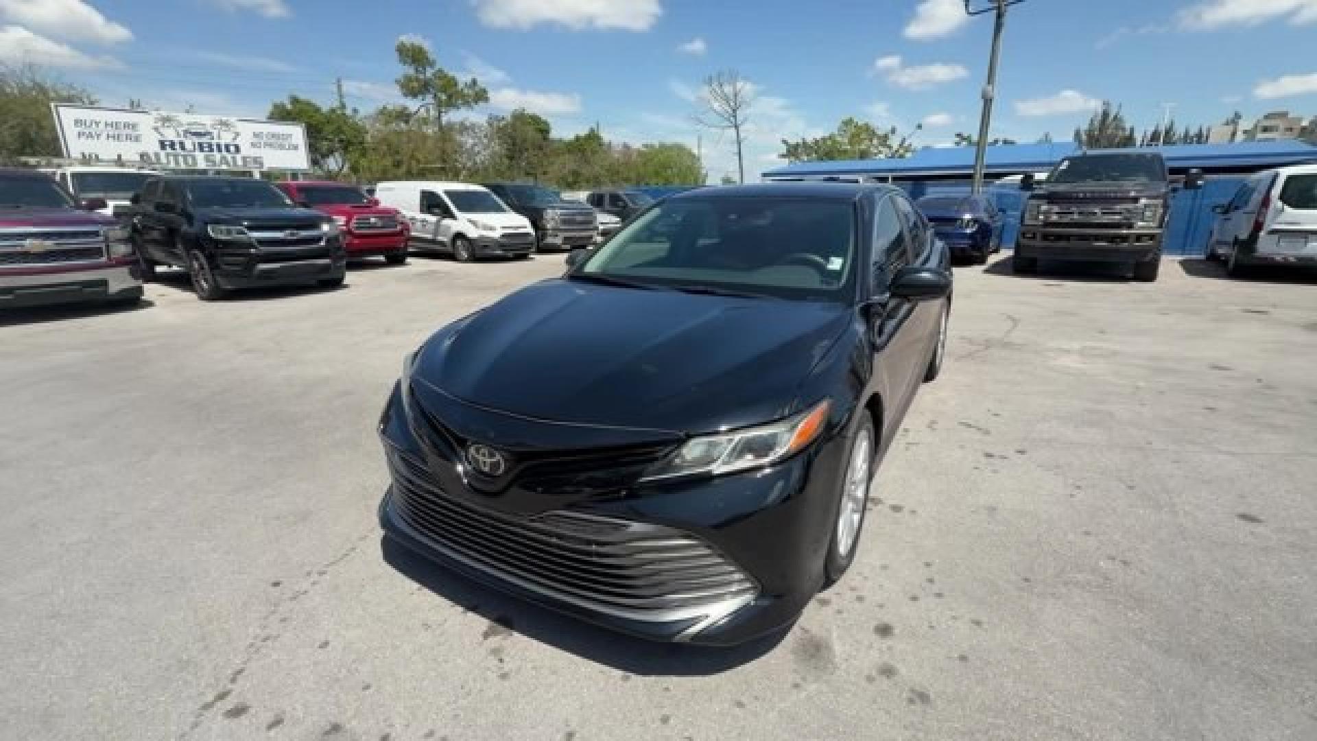 2019 Black Toyota Camry (4T1B11HK2KU) with an 4 2.5 L engine, Automatic transmission, located at 27610 S Dixie Hwy, Homestead, FL, 33032, (305) 749-2348, 25.510241, -80.438301 - KBB.com 10 Most Comfortable Cars Under $30,000. This Toyota Camry boasts a Regular Unleaded I-4 2.5 L/152 engine powering this Automatic transmission. Wireless Phone Connectivity, Window Grid And Roof Mount Antenna, Variable Intermittent Wipers.* This Toyota Camry Features the Following Options *Val - Photo#0