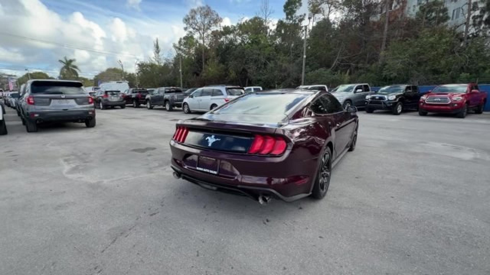 2018 Burgundy Ford Mustang (1FA6P8TH2J5) with an 4 2.3 L engine, Automatic transmission, located at 27610 S Dixie Hwy, Homestead, FL, 33032, (305) 749-2348, 25.510241, -80.438301 - KBB.com 10 Coolest Cars Under $25,000. Only 72,690 Miles! Delivers 31 Highway MPG and 21 City MPG! This Ford Mustang delivers a Intercooled Turbo Premium Unleaded I-4 2.3 L/140 engine powering this Automatic transmission. ENGINE: 2.3L ECOBOOST (STD), Wheels w/Locks, Trunk Rear Cargo Access.* This Fo - Photo#4