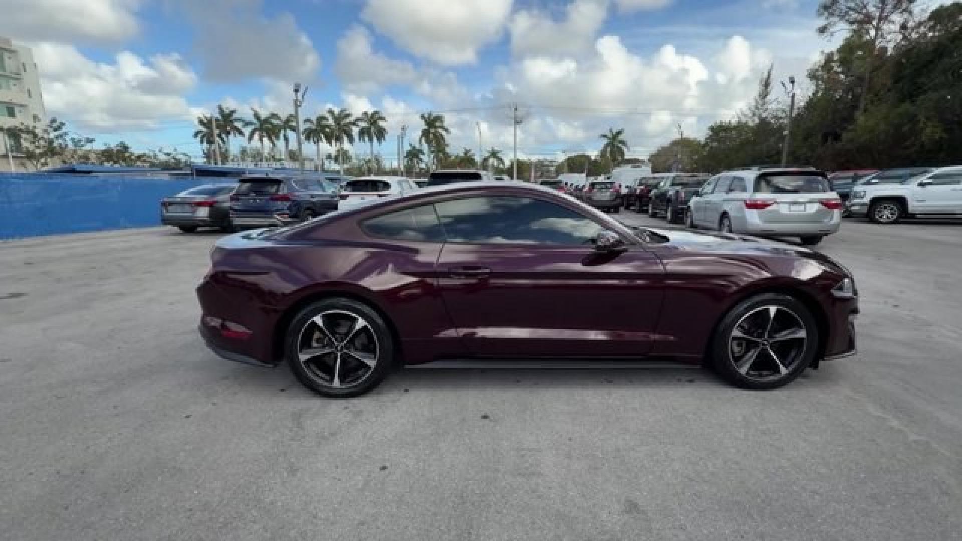 2018 Burgundy Ford Mustang (1FA6P8TH2J5) with an 4 2.3 L engine, Automatic transmission, located at 27610 S Dixie Hwy, Homestead, FL, 33032, (305) 749-2348, 25.510241, -80.438301 - KBB.com 10 Coolest Cars Under $25,000. Only 72,690 Miles! Delivers 31 Highway MPG and 21 City MPG! This Ford Mustang delivers a Intercooled Turbo Premium Unleaded I-4 2.3 L/140 engine powering this Automatic transmission. ENGINE: 2.3L ECOBOOST (STD), Wheels w/Locks, Trunk Rear Cargo Access.* This Fo - Photo#5