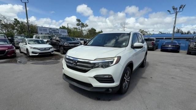 2017 White Honda Pilot (5FNYF6H39HB) with an 6 3.5 L engine, Automatic transmission, located at 27610 S Dixie Hwy, Homestead, FL, 33032, (305) 749-2348, 25.510241, -80.438301 - IIHS Top Safety Pick+. Only 96,081 Miles! Boasts 26 Highway MPG and 18 City MPG! This Honda Pilot boasts a Regular Unleaded V-6 3.5 L/212 engine powering this Automatic transmission. Wireless Phone Connectivity, Window Grid Antenna, Wheels: 18 Alloy.*This Honda Pilot Comes Equipped with These Option - Photo#0