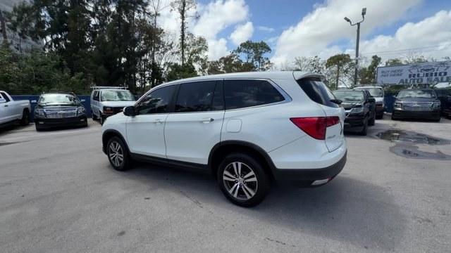 2017 White Honda Pilot (5FNYF6H39HB) with an 6 3.5 L engine, Automatic transmission, located at 27610 S Dixie Hwy, Homestead, FL, 33032, (305) 749-2348, 25.510241, -80.438301 - IIHS Top Safety Pick+. Only 96,081 Miles! Boasts 26 Highway MPG and 18 City MPG! This Honda Pilot boasts a Regular Unleaded V-6 3.5 L/212 engine powering this Automatic transmission. Wireless Phone Connectivity, Window Grid Antenna, Wheels: 18 Alloy.*This Honda Pilot Comes Equipped with These Option - Photo#2