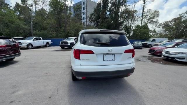 2017 White Honda Pilot (5FNYF6H39HB) with an 6 3.5 L engine, Automatic transmission, located at 27610 S Dixie Hwy, Homestead, FL, 33032, (305) 749-2348, 25.510241, -80.438301 - IIHS Top Safety Pick+. Only 96,081 Miles! Boasts 26 Highway MPG and 18 City MPG! This Honda Pilot boasts a Regular Unleaded V-6 3.5 L/212 engine powering this Automatic transmission. Wireless Phone Connectivity, Window Grid Antenna, Wheels: 18 Alloy.*This Honda Pilot Comes Equipped with These Option - Photo#3