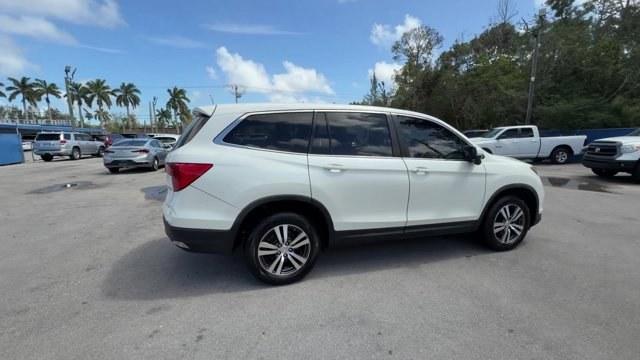 2017 White Honda Pilot (5FNYF6H39HB) with an 6 3.5 L engine, Automatic transmission, located at 27610 S Dixie Hwy, Homestead, FL, 33032, (305) 749-2348, 25.510241, -80.438301 - IIHS Top Safety Pick+. Only 96,081 Miles! Boasts 26 Highway MPG and 18 City MPG! This Honda Pilot boasts a Regular Unleaded V-6 3.5 L/212 engine powering this Automatic transmission. Wireless Phone Connectivity, Window Grid Antenna, Wheels: 18 Alloy.*This Honda Pilot Comes Equipped with These Option - Photo#5