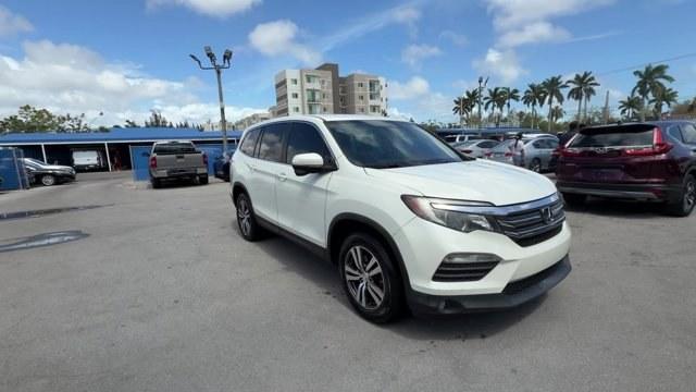 2017 White Honda Pilot (5FNYF6H39HB) with an 6 3.5 L engine, Automatic transmission, located at 27610 S Dixie Hwy, Homestead, FL, 33032, (305) 749-2348, 25.510241, -80.438301 - IIHS Top Safety Pick+. Only 96,081 Miles! Boasts 26 Highway MPG and 18 City MPG! This Honda Pilot boasts a Regular Unleaded V-6 3.5 L/212 engine powering this Automatic transmission. Wireless Phone Connectivity, Window Grid Antenna, Wheels: 18 Alloy.*This Honda Pilot Comes Equipped with These Option - Photo#6