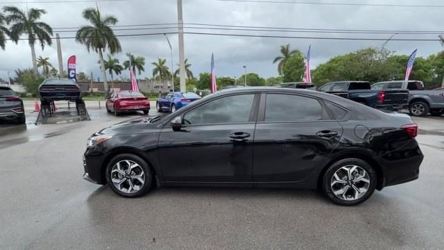 2019 Aurora Black /Gray Kia Forte (3KPF24AD1KE) with an 4 2.0 L engine, Variable transmission, located at 27610 S Dixie Hwy, Homestead, FL, 33032, (305) 749-2348, 25.510241, -80.438301 - KBB.com 10 Best Sedans Under $30,000. Scores 40 Highway MPG and 30 City MPG! This Kia Forte delivers a Regular Unleaded I-4 2.0 L/122 engine powering this Variable transmission. CARPETED FLOOR MATS, CARGO NET, AURORA BLACK.*This Kia Forte Comes Equipped with These Options *Woven Cloth Seat Trim, Wir - Photo#1