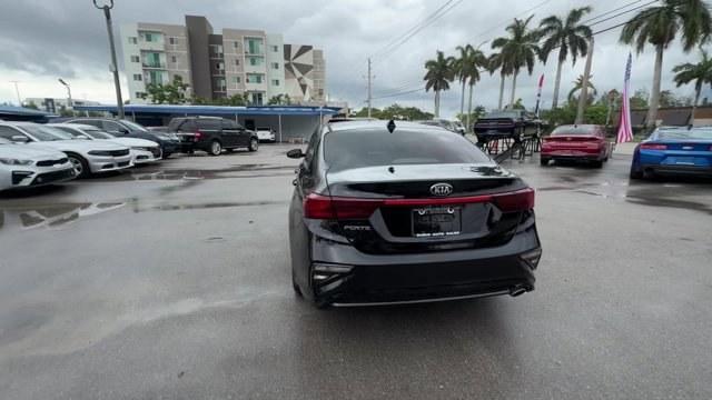 2019 Aurora Black /Gray Kia Forte (3KPF24AD1KE) with an 4 2.0 L engine, Variable transmission, located at 27610 S Dixie Hwy, Homestead, FL, 33032, (305) 749-2348, 25.510241, -80.438301 - KBB.com 10 Best Sedans Under $30,000. Scores 40 Highway MPG and 30 City MPG! This Kia Forte delivers a Regular Unleaded I-4 2.0 L/122 engine powering this Variable transmission. CARPETED FLOOR MATS, CARGO NET, AURORA BLACK.*This Kia Forte Comes Equipped with These Options *Woven Cloth Seat Trim, Wir - Photo#3