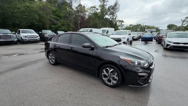 2019 Aurora Black /Gray Kia Forte (3KPF24AD1KE) with an 4 2.0 L engine, Variable transmission, located at 27610 S Dixie Hwy, Homestead, FL, 33032, (305) 749-2348, 25.510241, -80.438301 - KBB.com 10 Best Sedans Under $30,000. Scores 40 Highway MPG and 30 City MPG! This Kia Forte delivers a Regular Unleaded I-4 2.0 L/122 engine powering this Variable transmission. CARPETED FLOOR MATS, CARGO NET, AURORA BLACK.*This Kia Forte Comes Equipped with These Options *Woven Cloth Seat Trim, Wir - Photo#6