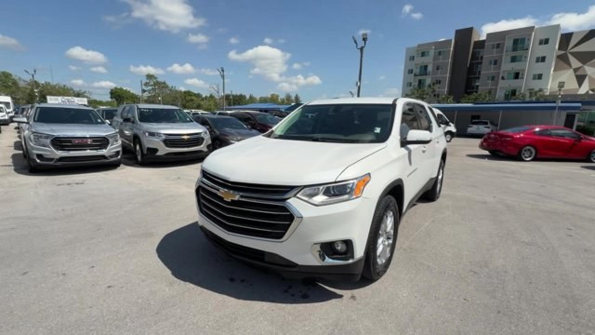 2021 Iridescent Pearl Tricoat /Dark Atmosphere/Medium Ash Gray Chevrolet Traverse (1GNEVGKW0MJ) with an 6 3.6L engine, Automatic transmission, located at 27610 S Dixie Hwy, Homestead, FL, 33032, (305) 749-2348, 25.510241, -80.438301 - IIHS Top Safety Pick with optional front crash prevention and specific headlights. Scores 25 Highway MPG and 17 City MPG! This Chevrolet Traverse boasts a Gas V6 3.6L/217 engine powering this Automatic transmission. WHEELS, 18 (45.7 CM) BRIGHT SILVER PAINTED ALUMINUM (STD), TRANSMISSION, 9-SPEED AUT - Photo#0
