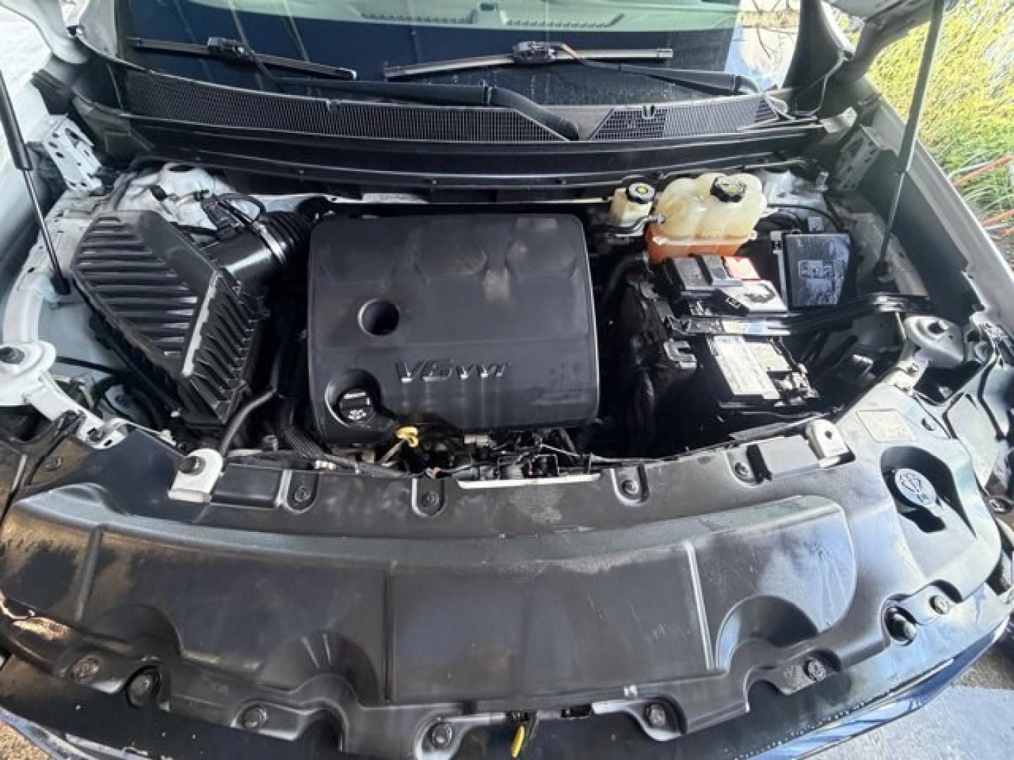 2021 Iridescent Pearl Tricoat /Dark Atmosphere/Medium Ash Gray Chevrolet Traverse (1GNEVGKW0MJ) with an 6 3.6L engine, Automatic transmission, located at 27610 S Dixie Hwy, Homestead, FL, 33032, (305) 749-2348, 25.510241, -80.438301 - IIHS Top Safety Pick with optional front crash prevention and specific headlights. Scores 25 Highway MPG and 17 City MPG! This Chevrolet Traverse boasts a Gas V6 3.6L/217 engine powering this Automatic transmission. WHEELS, 18 (45.7 CM) BRIGHT SILVER PAINTED ALUMINUM (STD), TRANSMISSION, 9-SPEED AUT - Photo#4