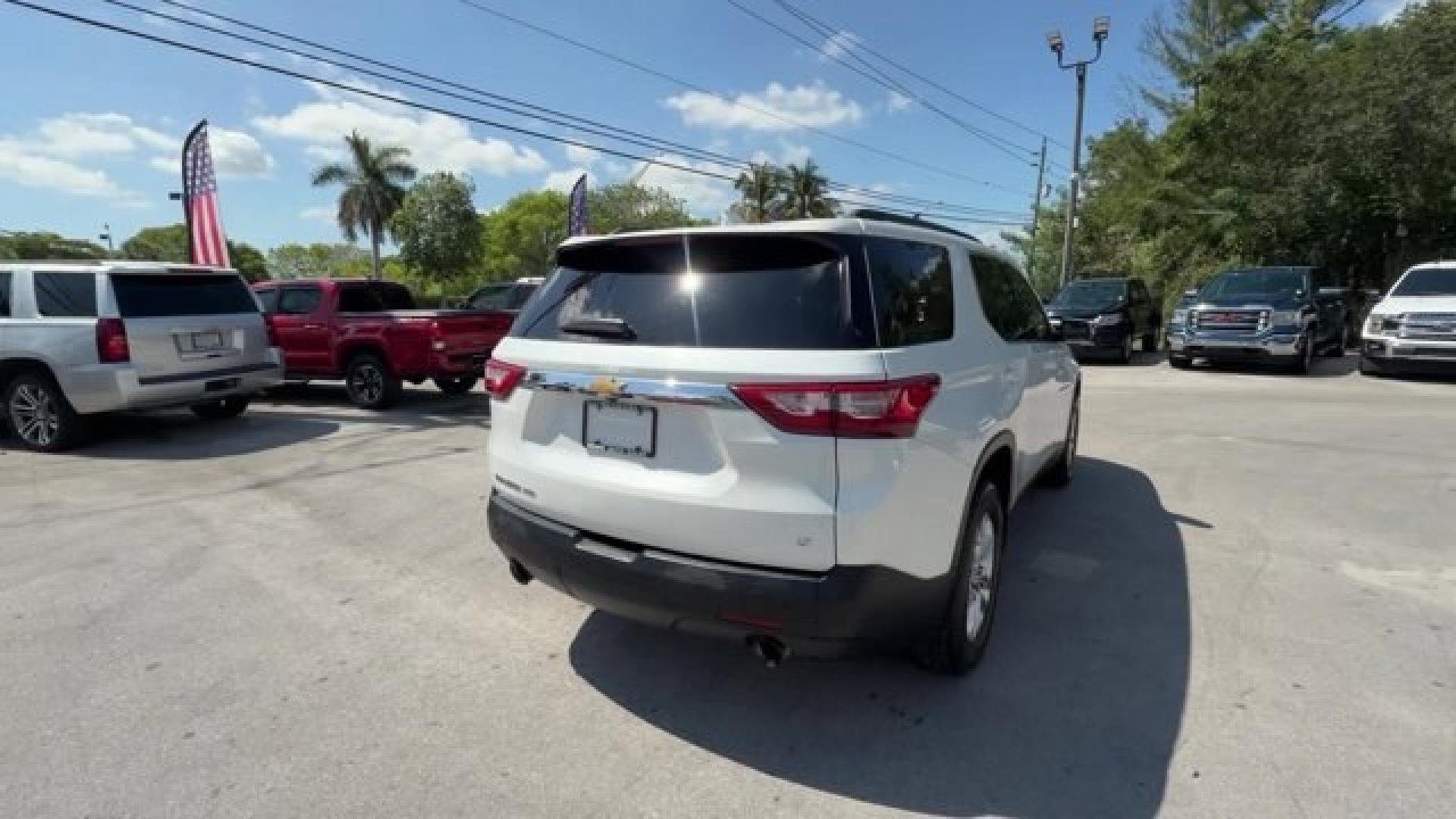 2021 Iridescent Pearl Tricoat /Dark Atmosphere/Medium Ash Gray Chevrolet Traverse (1GNEVGKW0MJ) with an 6 3.6L engine, Automatic transmission, located at 27610 S Dixie Hwy, Homestead, FL, 33032, (305) 749-2348, 25.510241, -80.438301 - IIHS Top Safety Pick with optional front crash prevention and specific headlights. Scores 25 Highway MPG and 17 City MPG! This Chevrolet Traverse boasts a Gas V6 3.6L/217 engine powering this Automatic transmission. WHEELS, 18 (45.7 CM) BRIGHT SILVER PAINTED ALUMINUM (STD), TRANSMISSION, 9-SPEED AUT - Photo#5