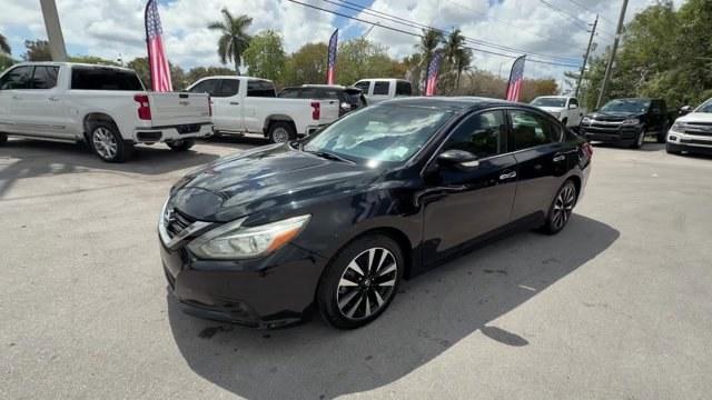 2018 Super Black /Charcoal Nissan Altima (1N4AL3AP3JC) with an 4 2.5 L engine, Variable transmission, located at 27610 S Dixie Hwy, Homestead, FL, 33032, (305) 749-2348, 25.510241, -80.438301 - Only 94,116 Miles! Delivers 38 Highway MPG and 27 City MPG! This Nissan Altima delivers a Regular Unleaded I-4 2.5 L/152 engine powering this Variable transmission. CHARCOAL, LEATHER APPOINTED SEAT TRIM, [Z66] ACTIVATION DISCLAIMER, [L92] FLOOR MATS PLUS TRUNK MAT (5-PIECE CARPETED).*This Nissan Alt - Photo#0