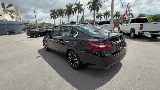 2018 Super Black /Charcoal Nissan Altima (1N4AL3AP3JC) with an 4 2.5 L engine, Variable transmission, located at 27610 S Dixie Hwy, Homestead, FL, 33032, (305) 749-2348, 25.510241, -80.438301 - Only 94,116 Miles! Delivers 38 Highway MPG and 27 City MPG! This Nissan Altima delivers a Regular Unleaded I-4 2.5 L/152 engine powering this Variable transmission. CHARCOAL, LEATHER APPOINTED SEAT TRIM, [Z66] ACTIVATION DISCLAIMER, [L92] FLOOR MATS PLUS TRUNK MAT (5-PIECE CARPETED).*This Nissan Alt - Photo#2