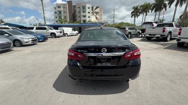 2018 Super Black /Charcoal Nissan Altima (1N4AL3AP3JC) with an 4 2.5 L engine, Variable transmission, located at 27610 S Dixie Hwy, Homestead, FL, 33032, (305) 749-2348, 25.510241, -80.438301 - Only 94,116 Miles! Delivers 38 Highway MPG and 27 City MPG! This Nissan Altima delivers a Regular Unleaded I-4 2.5 L/152 engine powering this Variable transmission. CHARCOAL, LEATHER APPOINTED SEAT TRIM, [Z66] ACTIVATION DISCLAIMER, [L92] FLOOR MATS PLUS TRUNK MAT (5-PIECE CARPETED).*This Nissan Alt - Photo#3
