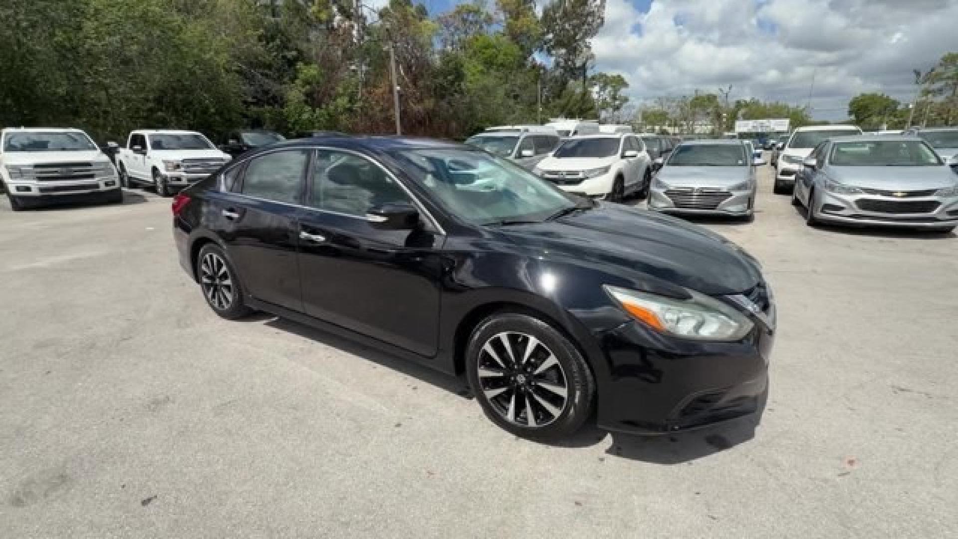 2018 Super Black /Charcoal Nissan Altima (1N4AL3AP3JC) with an 4 2.5 L engine, Variable transmission, located at 27610 S Dixie Hwy, Homestead, FL, 33032, (305) 749-2348, 25.510241, -80.438301 - Only 94,116 Miles! Delivers 38 Highway MPG and 27 City MPG! This Nissan Altima delivers a Regular Unleaded I-4 2.5 L/152 engine powering this Variable transmission. CHARCOAL, LEATHER APPOINTED SEAT TRIM, [Z66] ACTIVATION DISCLAIMER, [L92] FLOOR MATS PLUS TRUNK MAT (5-PIECE CARPETED).*This Nissan Alt - Photo#6