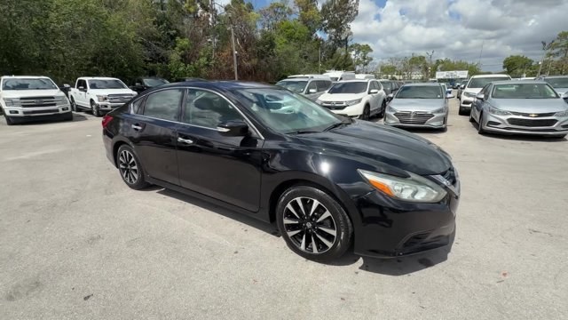 2018 Super Black /Charcoal Nissan Altima (1N4AL3AP3JC) with an 4 2.5 L engine, Variable transmission, located at 27610 S Dixie Hwy, Homestead, FL, 33032, (305) 749-2348, 25.510241, -80.438301 - Only 94,116 Miles! Delivers 38 Highway MPG and 27 City MPG! This Nissan Altima delivers a Regular Unleaded I-4 2.5 L/152 engine powering this Variable transmission. CHARCOAL, LEATHER APPOINTED SEAT TRIM, [Z66] ACTIVATION DISCLAIMER, [L92] FLOOR MATS PLUS TRUNK MAT (5-PIECE CARPETED).*This Nissan Alt - Photo#6