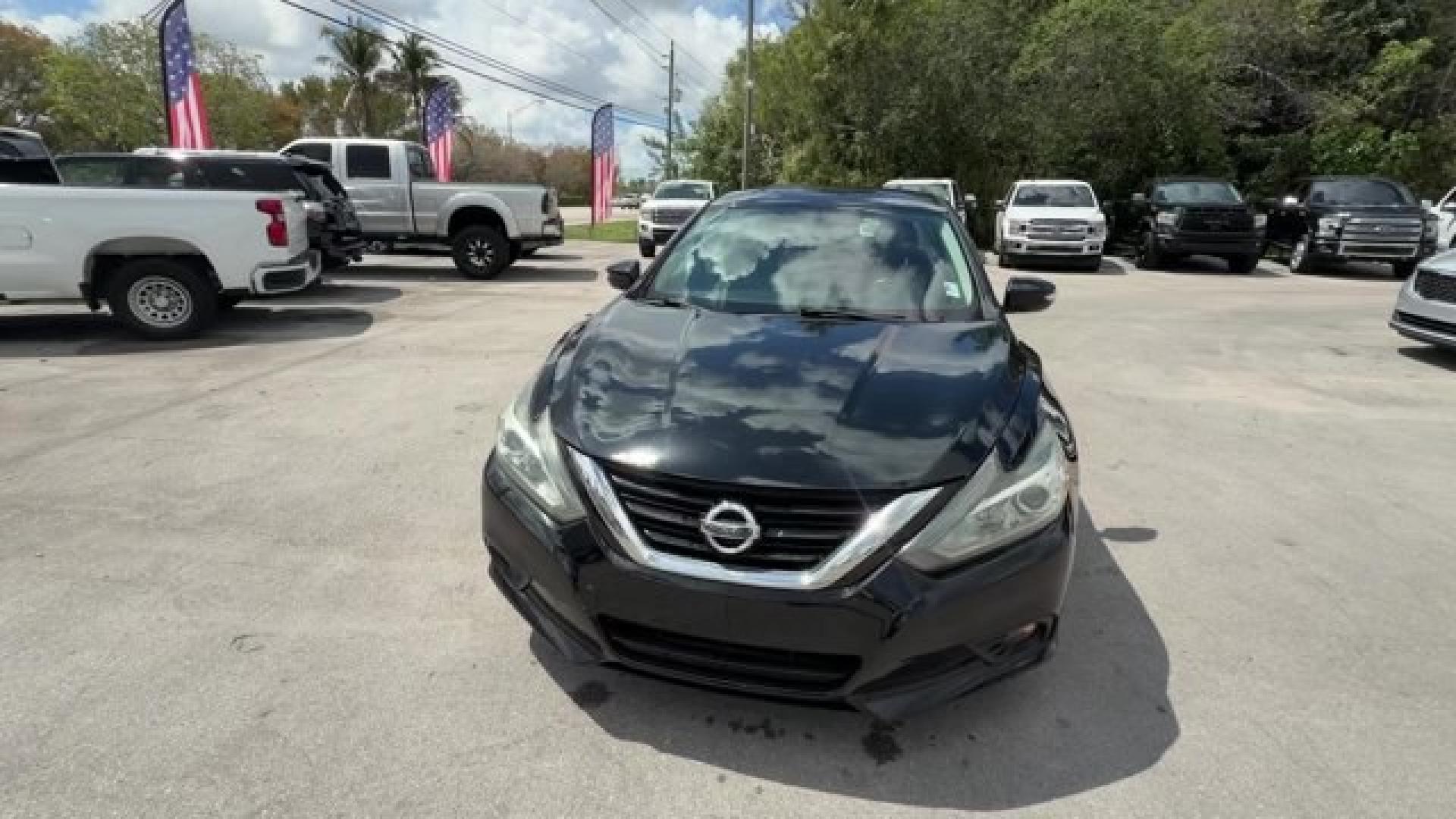 2018 Super Black /Charcoal Nissan Altima (1N4AL3AP3JC) with an 4 2.5 L engine, Variable transmission, located at 27610 S Dixie Hwy, Homestead, FL, 33032, (305) 749-2348, 25.510241, -80.438301 - Only 94,116 Miles! Delivers 38 Highway MPG and 27 City MPG! This Nissan Altima delivers a Regular Unleaded I-4 2.5 L/152 engine powering this Variable transmission. CHARCOAL, LEATHER APPOINTED SEAT TRIM, [Z66] ACTIVATION DISCLAIMER, [L92] FLOOR MATS PLUS TRUNK MAT (5-PIECE CARPETED).*This Nissan Alt - Photo#7
