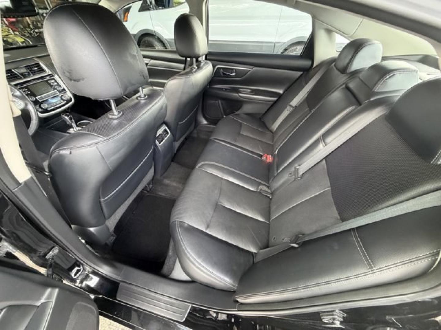 2018 Super Black /Charcoal Nissan Altima (1N4AL3AP3JC) with an 4 2.5 L engine, Variable transmission, located at 27610 S Dixie Hwy, Homestead, FL, 33032, (305) 749-2348, 25.510241, -80.438301 - Only 94,116 Miles! Delivers 38 Highway MPG and 27 City MPG! This Nissan Altima delivers a Regular Unleaded I-4 2.5 L/152 engine powering this Variable transmission. CHARCOAL, LEATHER APPOINTED SEAT TRIM, [Z66] ACTIVATION DISCLAIMER, [L92] FLOOR MATS PLUS TRUNK MAT (5-PIECE CARPETED).*This Nissan Alt - Photo#13