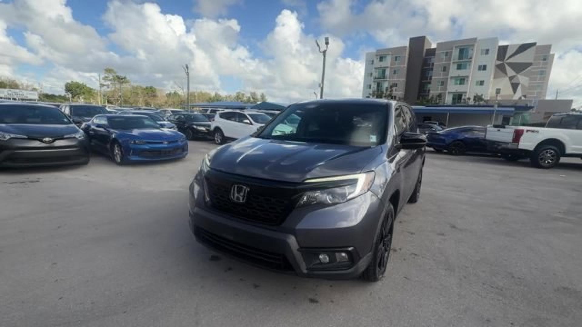 2021 Gray Honda Passport (5FNYF8H24MB) with an 6 3.5 L engine, Automatic transmission, located at 27610 S Dixie Hwy, Homestead, FL, 33032, (305) 749-2348, 25.510241, -80.438301 - ALG Residual Value Awards, Residual Value Awards. Scores 24 Highway MPG and 19 City MPG! This Honda Passport delivers a Regular Unleaded V-6 3.5 L/212 engine powering this Automatic transmission. Wireless Phone Connectivity, Vehicle Stability Assist (VSA) Electronic Stability Control (ESC), Variable - Photo#0