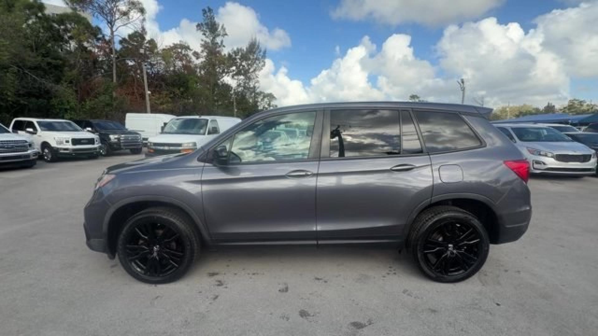 2021 Gray Honda Passport (5FNYF8H24MB) with an 6 3.5 L engine, Automatic transmission, located at 27610 S Dixie Hwy, Homestead, FL, 33032, (305) 749-2348, 25.510241, -80.438301 - ALG Residual Value Awards, Residual Value Awards. Scores 24 Highway MPG and 19 City MPG! This Honda Passport delivers a Regular Unleaded V-6 3.5 L/212 engine powering this Automatic transmission. Wireless Phone Connectivity, Vehicle Stability Assist (VSA) Electronic Stability Control (ESC), Variable - Photo#1
