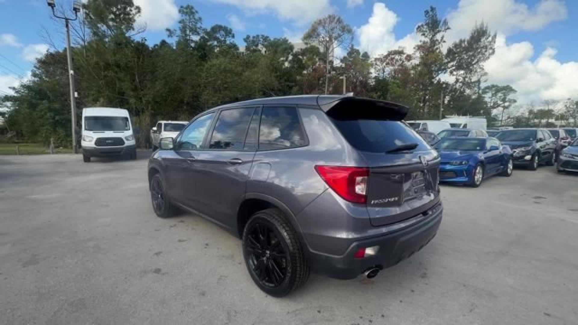 2021 Gray Honda Passport (5FNYF8H24MB) with an 6 3.5 L engine, Automatic transmission, located at 27610 S Dixie Hwy, Homestead, FL, 33032, (305) 749-2348, 25.510241, -80.438301 - ALG Residual Value Awards, Residual Value Awards. Scores 24 Highway MPG and 19 City MPG! This Honda Passport delivers a Regular Unleaded V-6 3.5 L/212 engine powering this Automatic transmission. Wireless Phone Connectivity, Vehicle Stability Assist (VSA) Electronic Stability Control (ESC), Variable - Photo#2