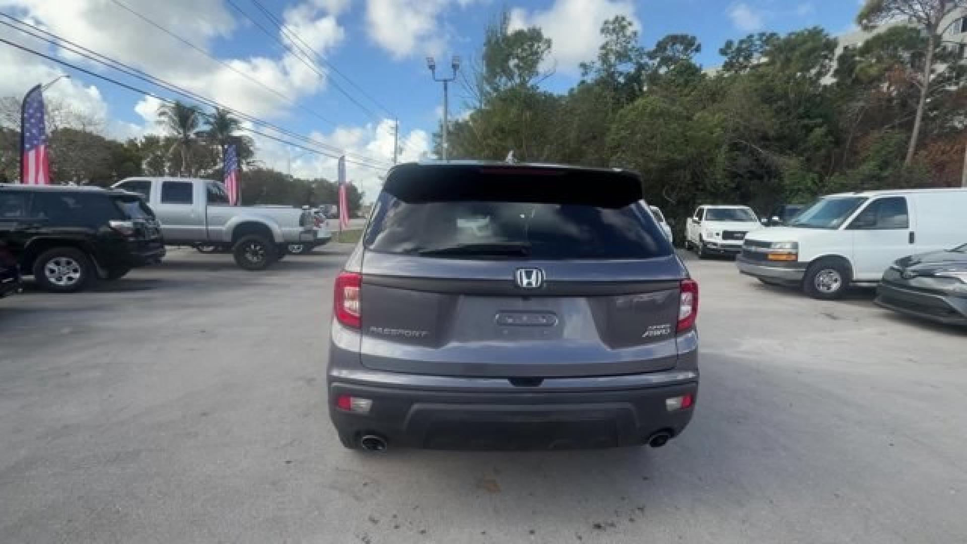 2021 Gray Honda Passport (5FNYF8H24MB) with an 6 3.5 L engine, Automatic transmission, located at 27610 S Dixie Hwy, Homestead, FL, 33032, (305) 749-2348, 25.510241, -80.438301 - ALG Residual Value Awards, Residual Value Awards. Scores 24 Highway MPG and 19 City MPG! This Honda Passport delivers a Regular Unleaded V-6 3.5 L/212 engine powering this Automatic transmission. Wireless Phone Connectivity, Vehicle Stability Assist (VSA) Electronic Stability Control (ESC), Variable - Photo#3